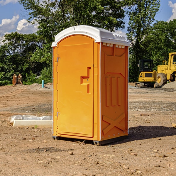 how often are the porta potties cleaned and serviced during a rental period in Hecla